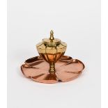 A WAS Benson copper and brass seedpod inkwell, model no.553A, fluted copper lily-pad tray supporting