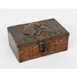 A John Pearson repousse copper casket, dated 1905, rectangular section with hinged cover, the