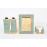 A Linley shagreen mounted desk set, comprising two candlesticks, with polished metal sconces, a