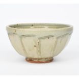 Richard Batterham (1936-2021) a large cut-sided stoneware footed bowl, covered to the foot with an