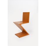 An Alivar Zigzag chair originally designed by Gerrit Rietveld, ash planks with dovetailed joints,