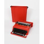 An Olivetti Valentine portable typewriter designed by Ettorre Sottsass, in red plastic case, cast