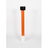 An enamelled metal pipe in the Memphis style, black, orange and white enamelled elements,