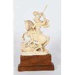 λ Anon St George and the Dragon carved ivory on wooden base probably Indian or Chinese, and a Dieppe