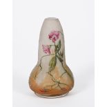 An Art Nouveau Daum Nancy enamelled glass vase, ovoid with tapering cylindrical neck, enamelled with
