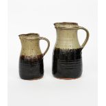 Richard Batterham (1936-2021) two graduated stoneware jugs, the neck glazed ash, the cylindrical