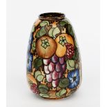 An early Bursley Ware Pomona vase designed by Charlotte Rhead, pattern 456, tubeline decorated
