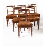 A set of six Aesthetic Movement walnut chairs, with turned legs and bobbin backs, unsigned, 90cm.