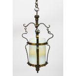 A WAS Benson brass lantern with James Powell vaseline glass shade, strapwork with foliate panel to