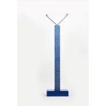 A Memphis Milano Svincolo floor lamp designed by Ettore Sottsass, laminated blue square base