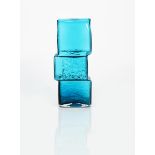 A Whitefriars Kingfisher Blue glass Drunken Bricklayer vase designed by Geoffrey Baxter, textured