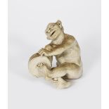 A Martin Brothers stoneware Imp Musician by Robert Wallace Martin, dated 1910, modelled seated