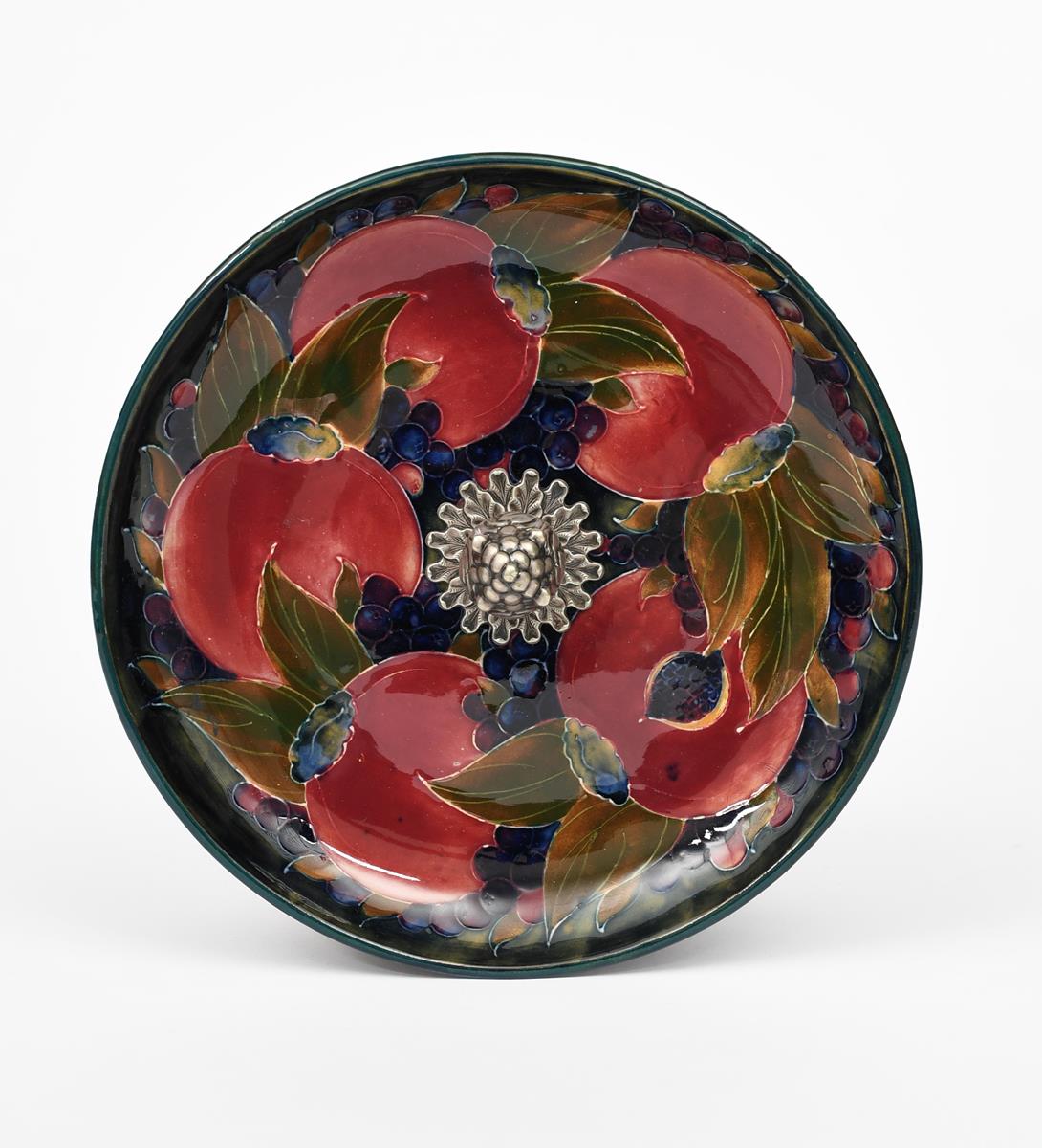 'Pomegranate' a Moorcroft Pottery plate with Tiffany & Co metal mount designed by William Moorcroft,