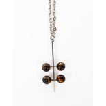 A Niels Erik From silver and tiger's eye pendant necklace, central bar with four tiger's eye