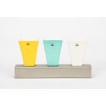 A Giotto ceramic three vase in a metal stand set designed by Johanna Grawunder, designed 1991, three