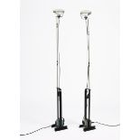 A pair of Flos Toio floor lamps designed by Achille Castiglioni, designed 1962, black enamelled base