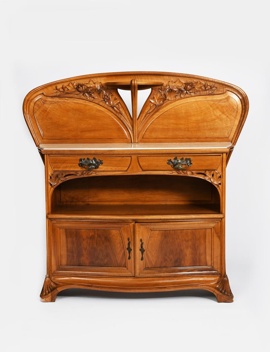 A fine Art Nouveau tulipwood dining room suite designed by Camille Gauthier, previously also