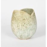 ‡John Ward (born 1938) a hand-built stoneware Tulip vase, mottled green on a white ground,