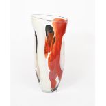A large glass vase possibly Italian, red and white stripes and spots, cased in clear,