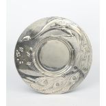 An Art Nouveau Ludwig Lichtinger polished pewter charger designed by K Goss, circular, decorated