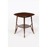 A Majorelle Olga mahogany table designed by Louis Majorelle, rounded square section top and shelf