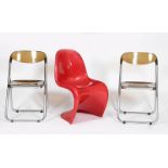 A Herman Miller red plastic Panton chair designed by Verner Panton, a pair of chrome metal and