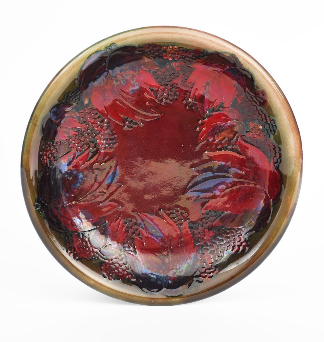 'Flambe Leaf and Blackberry' a Moorcroft Pottery plate designed by William Moorcroft, tubeline