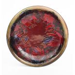 'Flambe Leaf and Blackberry' a Moorcroft Pottery plate designed by William Moorcroft, tubeline