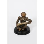 A Martin Brothers stoneware Imp Musician by Robert Wallace Martin, modelled seated singing from a
