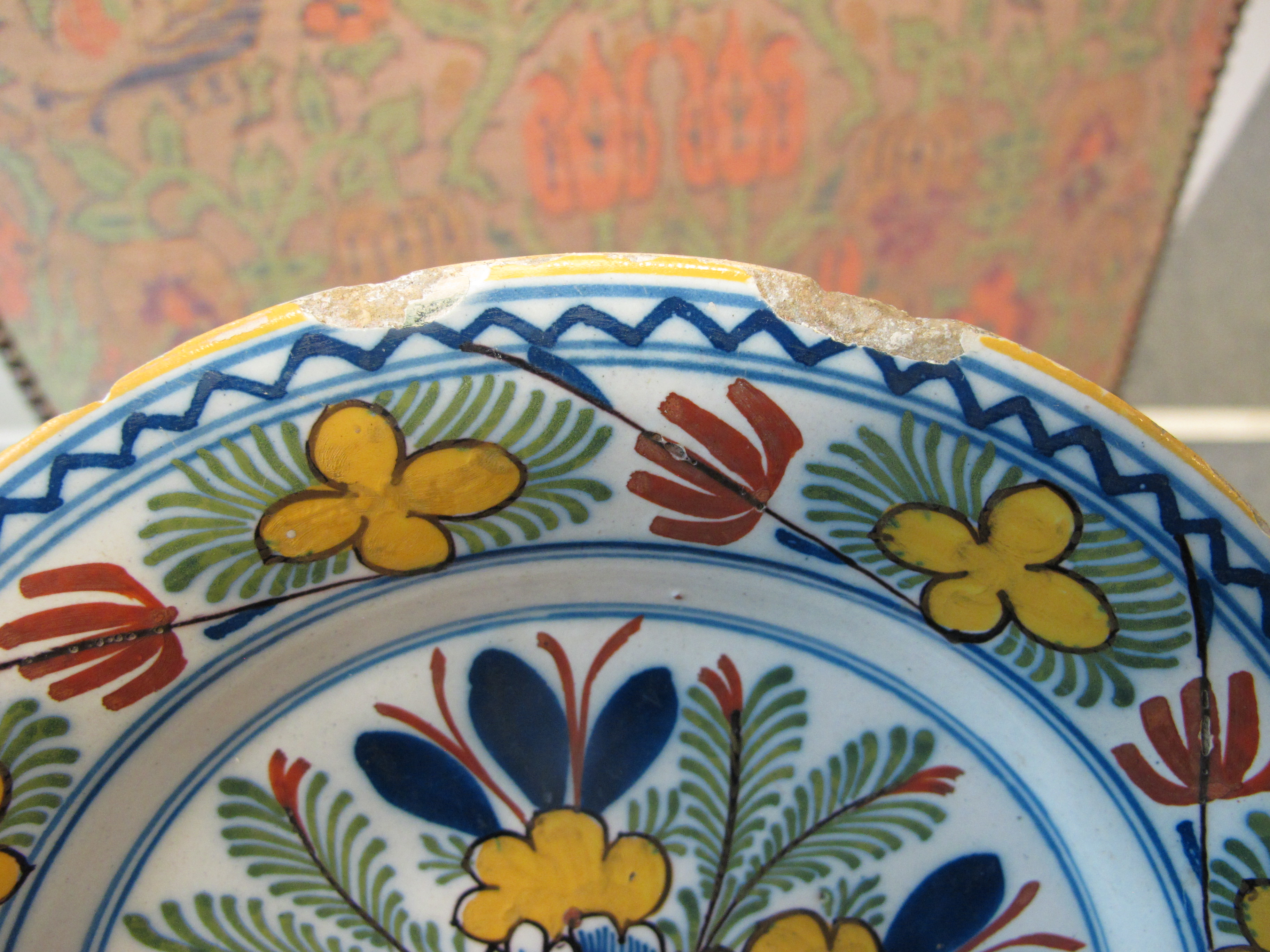 THREE DELFTWARE POTTERY PLATES 18TH CENTURY polychrome decorated with a bird on a fence, and urns of - Image 20 of 24