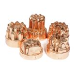 FIVE VICTORIAN COPPER JELLY MOULDS 19TH CENTURY four stamped 'ASC' possibly for All Souls College,