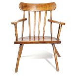 AN IRISH PRIMITIVE SYCAMORE AND ASH 'GIBSON' ARMCHAIR 19TH CENTURY the curved comb top rail above