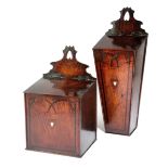 λ A PAIR OF GEORGE III OAK SALT AND CANDLE BOXES EARLY 19TH CENTURY each with a shaped fret surmount