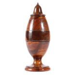 A GEORGE IV TREEN LIGNUM VITAE COFFEE GRINDER C.1820-30 of bullet shape, in three sections, with a
