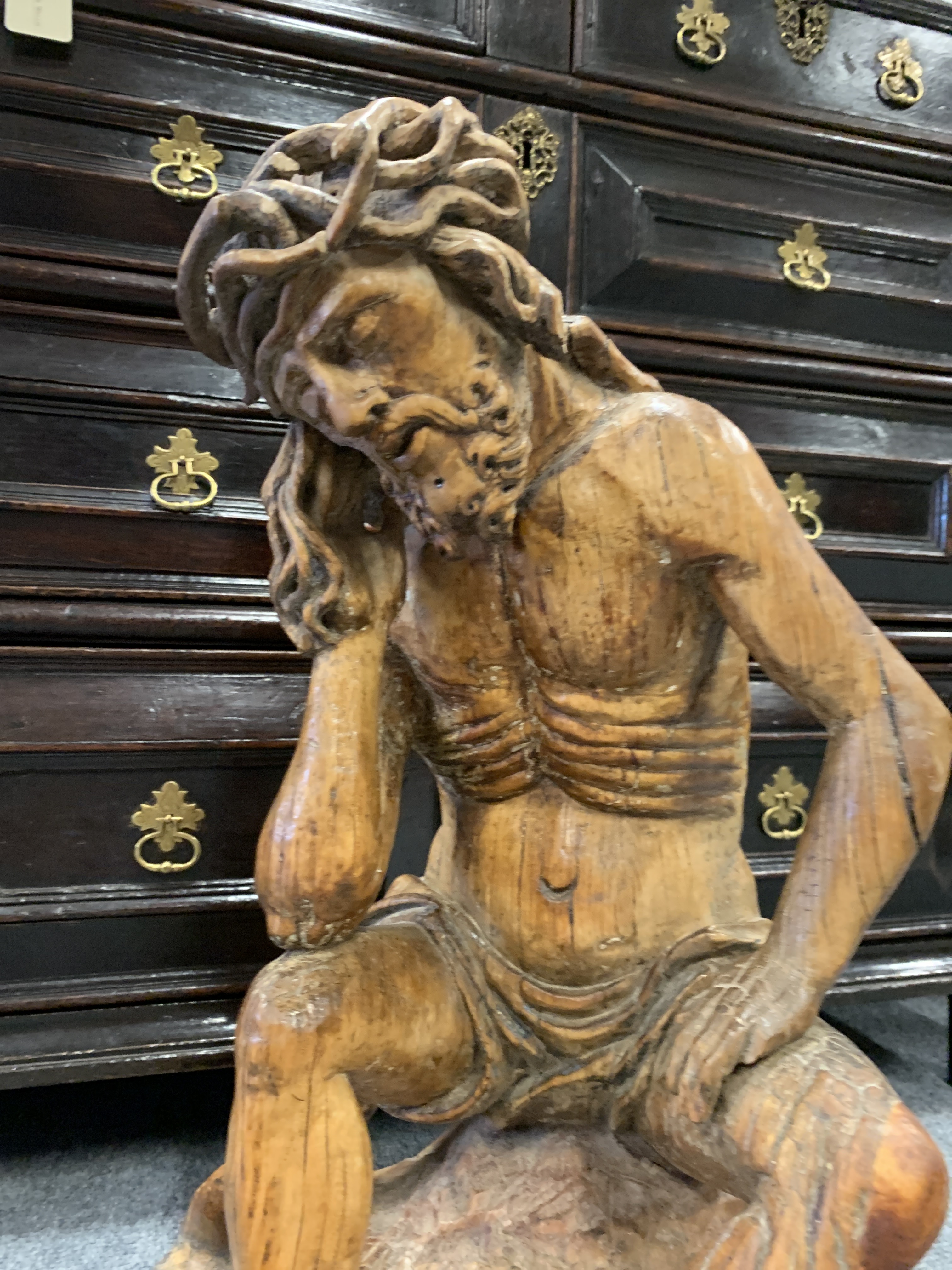 A GERMAN CARVED LIMEWOOD FIGURE OF CHRIST THE MAN OF SORROWS 16TH CENTURY depicted seated wearing - Image 3 of 22