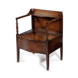 A GEORGE III MAHOGANY 'LANCASHIRE' BEDSIDE COMMODE C.1800 with a hinged top on turned arm