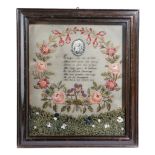 A FRENCH NEEDLEWORK SAMPLER DATED '1839' worked with a wreath of flowers above a grassy hedgerow