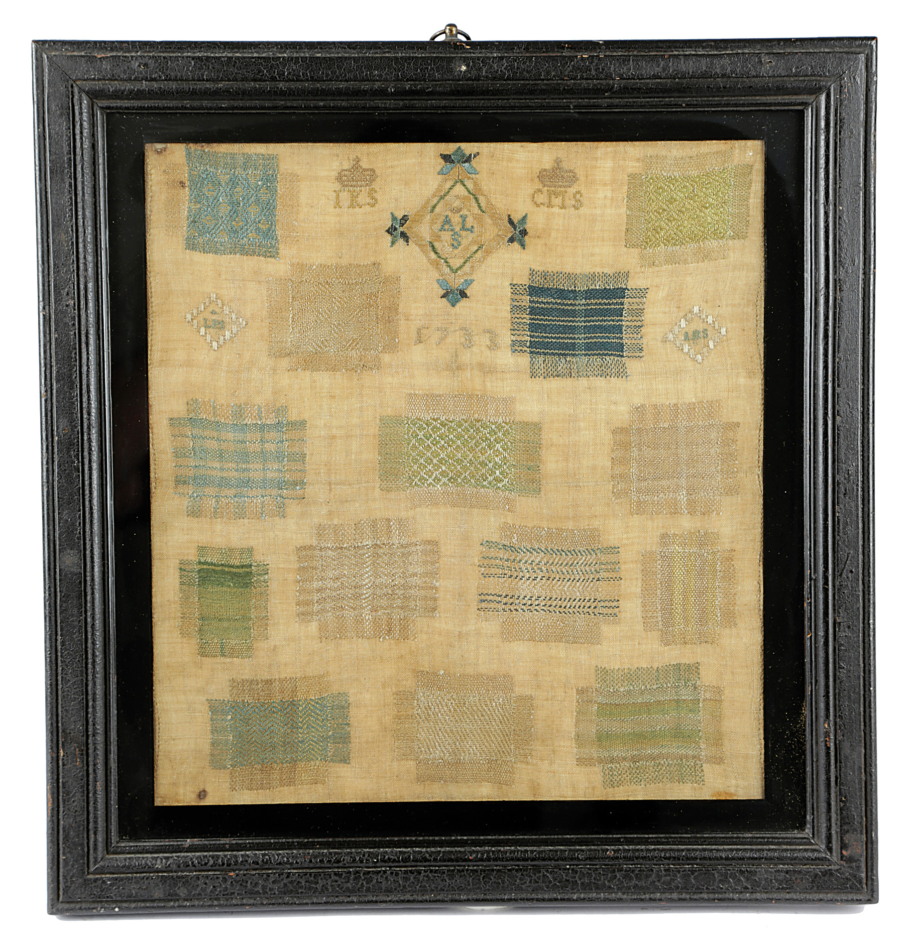 A NORTH EUROPEAN NEEDLEWORK DARNING SAMPLER DATED 1733 worked with fourteen large darns, signed with
