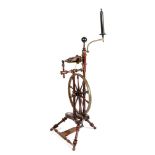 A FRUITWOOD AND BEECHWOOD SPINNING WHEEL EARLY 19TH CENTURY with brass, bone and ebonised mounts,