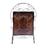 AN ARTS & CRAFTS COPPER AND WROUGHT IRON FIRESCREEN IN THE MANNER OF JOHN PEARSON, LATE 19TH / EARLY