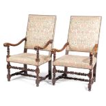 A PAIR OF WALNUT HIGHBACK OPEN ARMCHAIRS POSSIBLY DUTCH, LATE 17TH / EARLY 18TH CENTURY each with