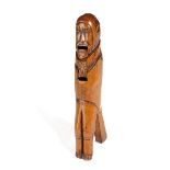A TREEN BOXWOOD PRIMITIVE FIGURAL NUTCRACKER LATE 17TH / EARLY 18TH CENTURY with a lever action,