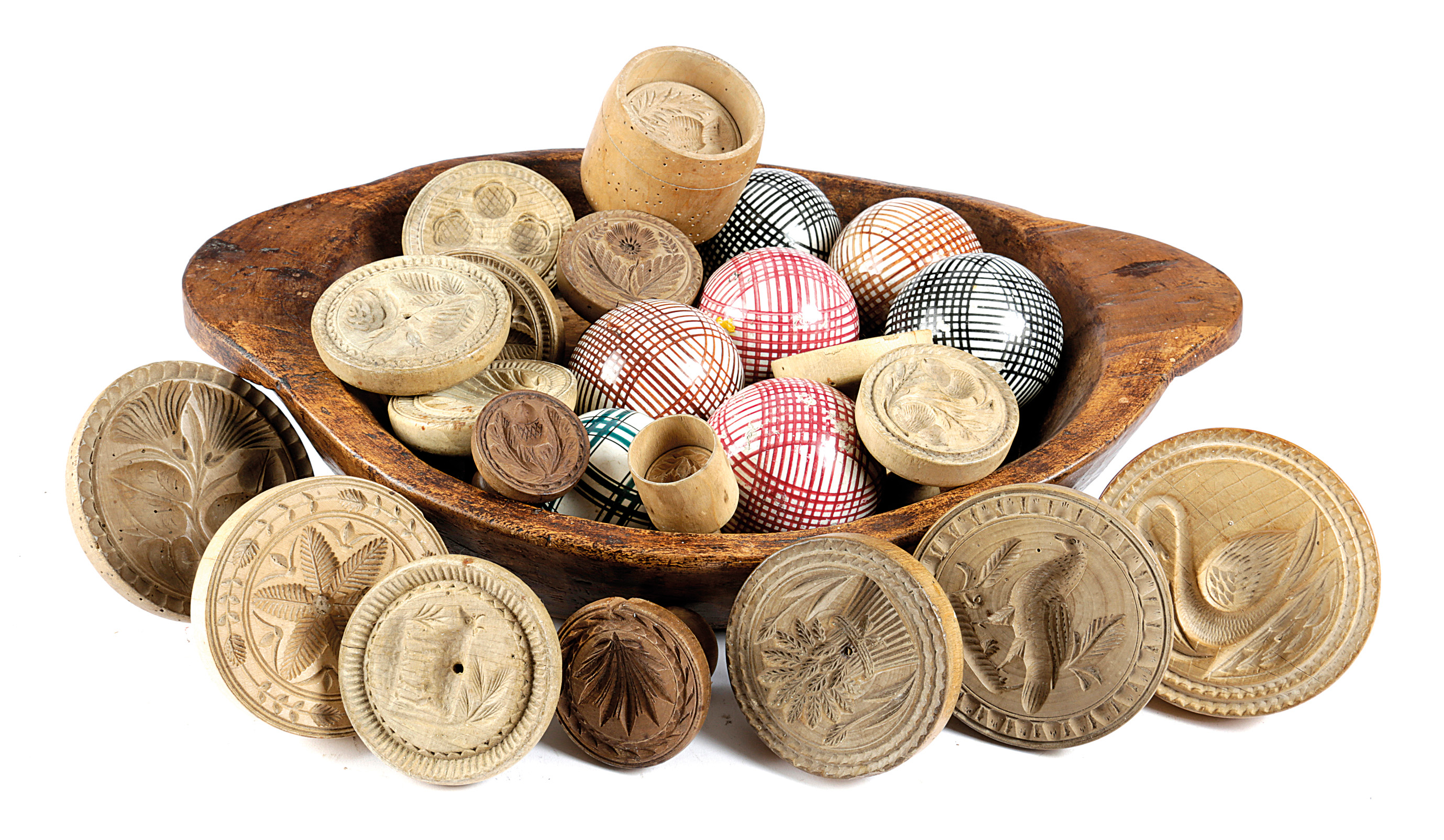 SEVENTEEN TREEN BUTTER STAMPS / MOULDS 19TH CENTURY AND LATER the majority sycamore, with various