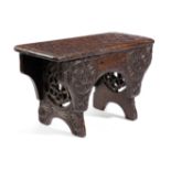 A GEORGE III CHIP CARVED STOOL WELSH, DATED '1778' relief decorated with rondels, the trestle ends