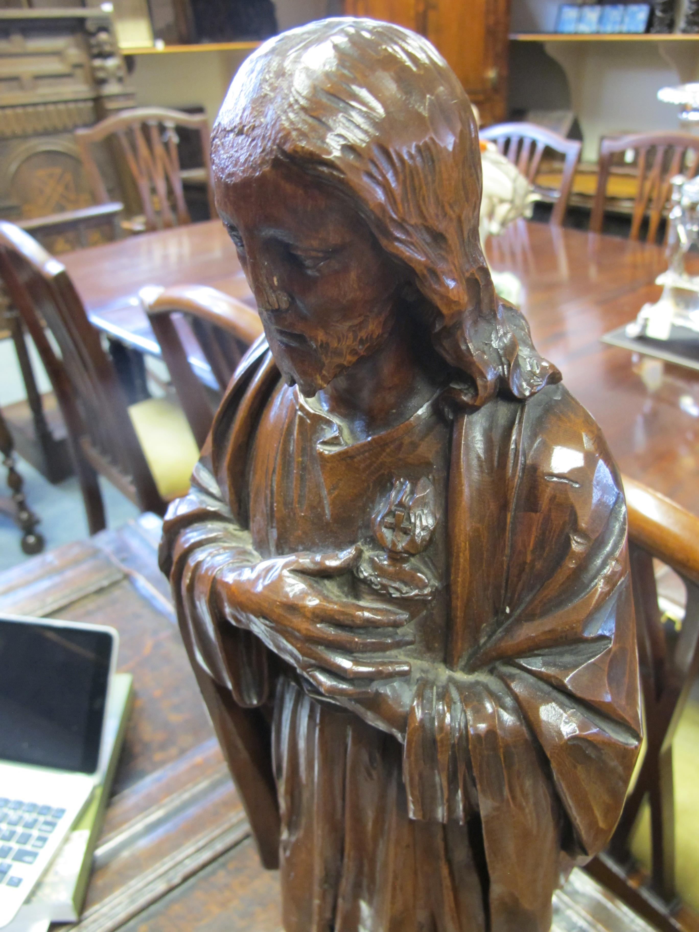 A CARVED LIMEWOOD FIGURE OF JESUS CHRIST POSSIBLY GERMAN, 18TH CENTURY depicted robed with his - Image 3 of 15