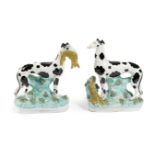 A PAIR OF STAFFORDSHIRE POTTERY GROUPS OF 'DISRAELI' GREYHOUNDS MID-19TH CENTURY each painted