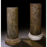 A PAIR OF ITALIAN MOTTLED MARBLE COLUMNS 19TH CENTURY each on a different associated white marble