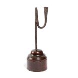 A WROUGHT IRON AND TREEN TABLE RUSHNIP AND CANDLEHOLDER 18TH CENTURY on a turned treen base 24.8cm