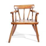 AN IRISH PRIMITIVE SYCAMORE AND ASH 'GIBSON' CHILD'S ARMCHAIR 19TH CENTURY with red painted