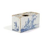 A RARE DELFTWARE POTTERY FLOWER BRICK C.1740-60 painted in blue with figures, including a lady